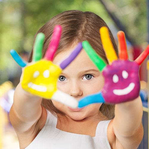 Nurturing Safety: Creating a Haven for Young Children at Home girl hand painting - Nurturing Safety: Creating a Haven for Young Children at Home